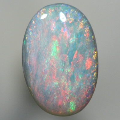 SOLID SEMI BLACK OPAL Colourful display of red over green and blue